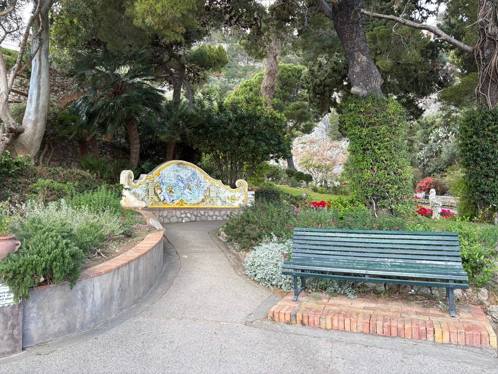 A bench and gardens in the Gardens of Augustus