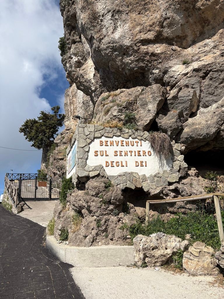 Sign marking the start of the Path of the Gods trail in Bomerano.
